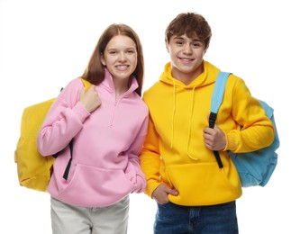 Photo of Teenage girl and boy with backpacks on white background
