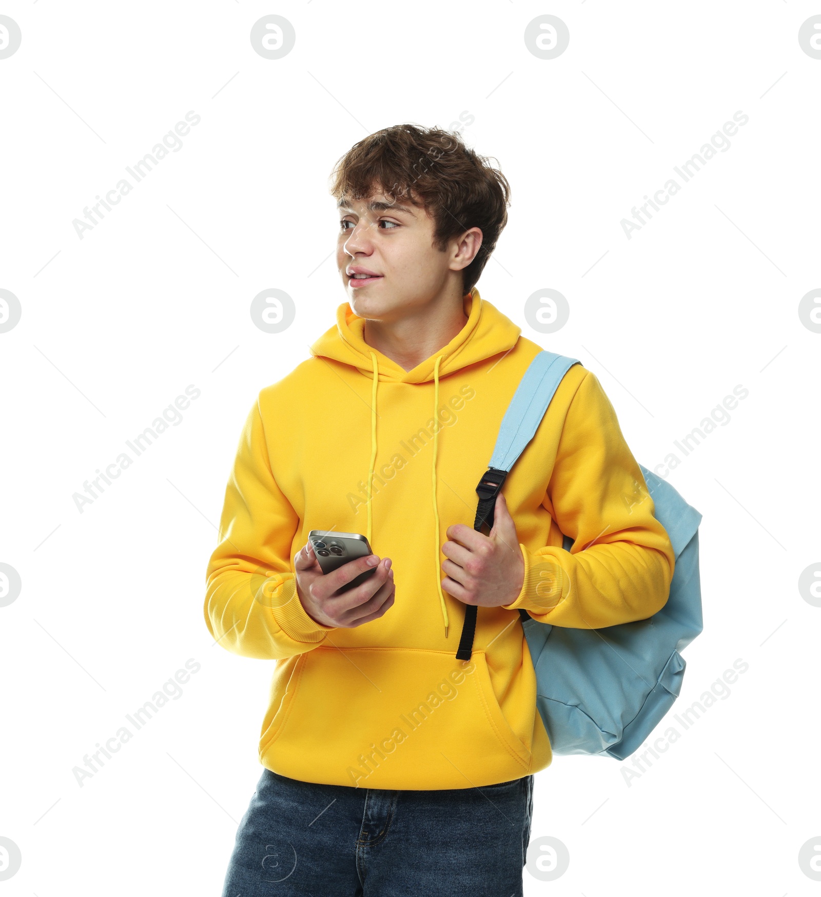 Teenage boy with smartphone and backpack on white background Photo of Teenage boy with smartphone and backpack on white background