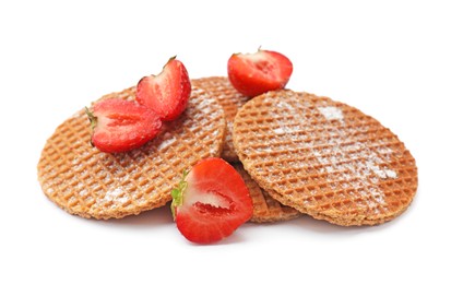 Photo of Tasty Dutch waffles (stroopwafels) and strawberries isolated on white