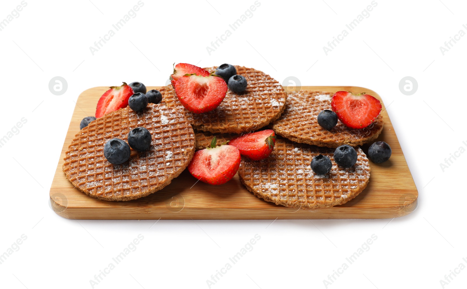 Tasty Dutch waffles (stroopwafels) and berries isolated on white Photo of Tasty Dutch waffles (stroopwafels) and berries isolated on white