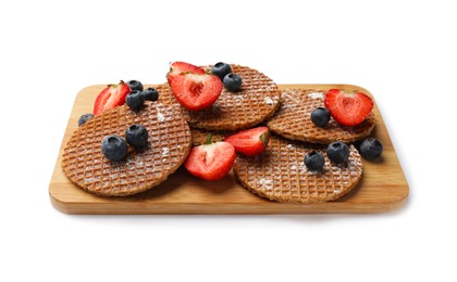 Photo of Tasty Dutch waffles (stroopwafels) and berries isolated on white