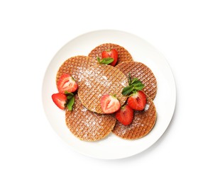 Photo of Tasty Dutch waffles (stroopwafels), mint and strawberries isolated on white, top view