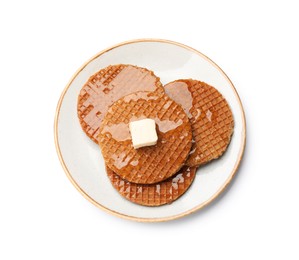 Photo of Tasty Dutch waffles (stroopwafels) with honey and butter cube isolated on white, top view