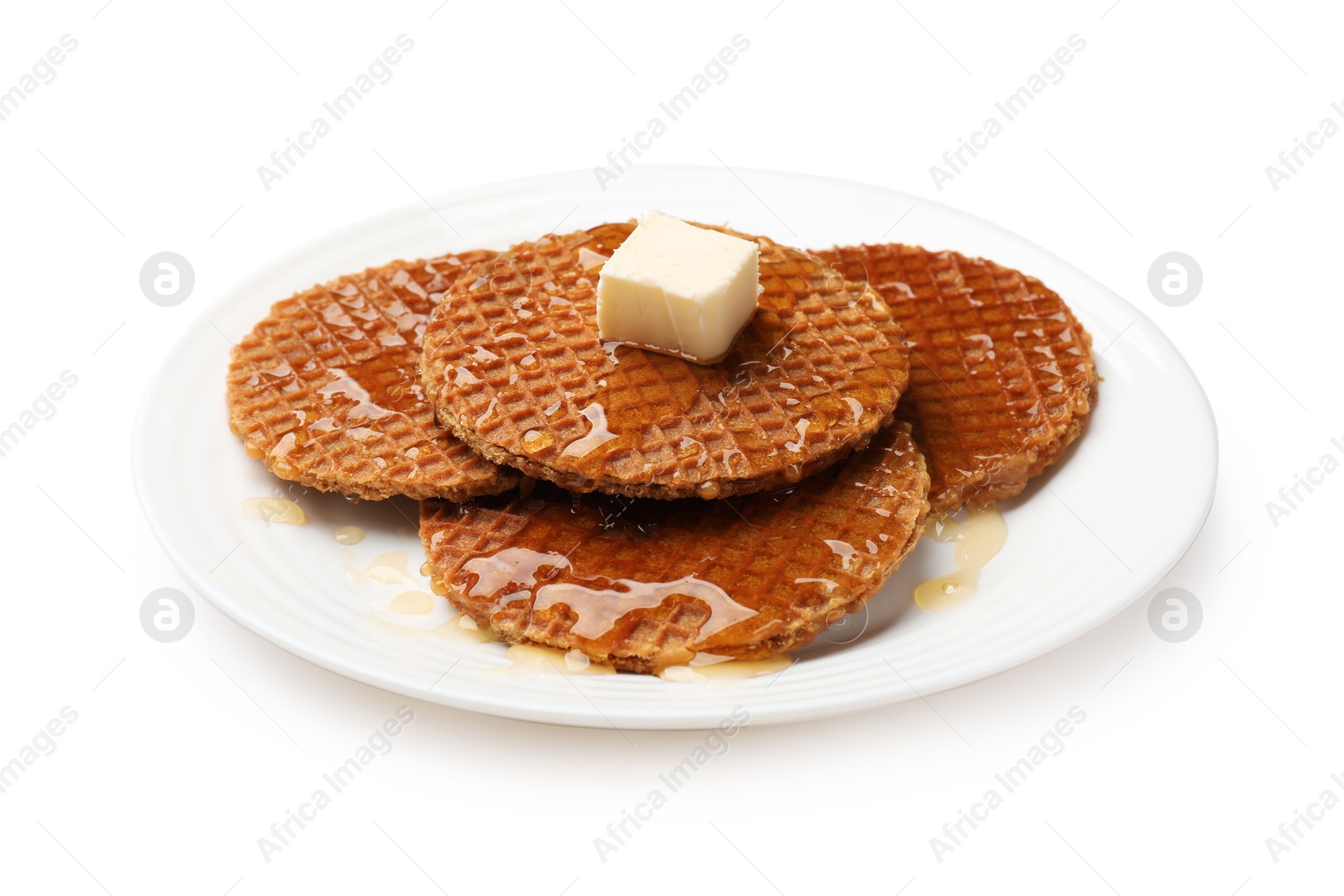 Tasty Dutch waffles (stroopwafels) with honey and butter cube isolated on white Photo of Tasty Dutch waffles (stroopwafels) with honey and butter cube isolated on white