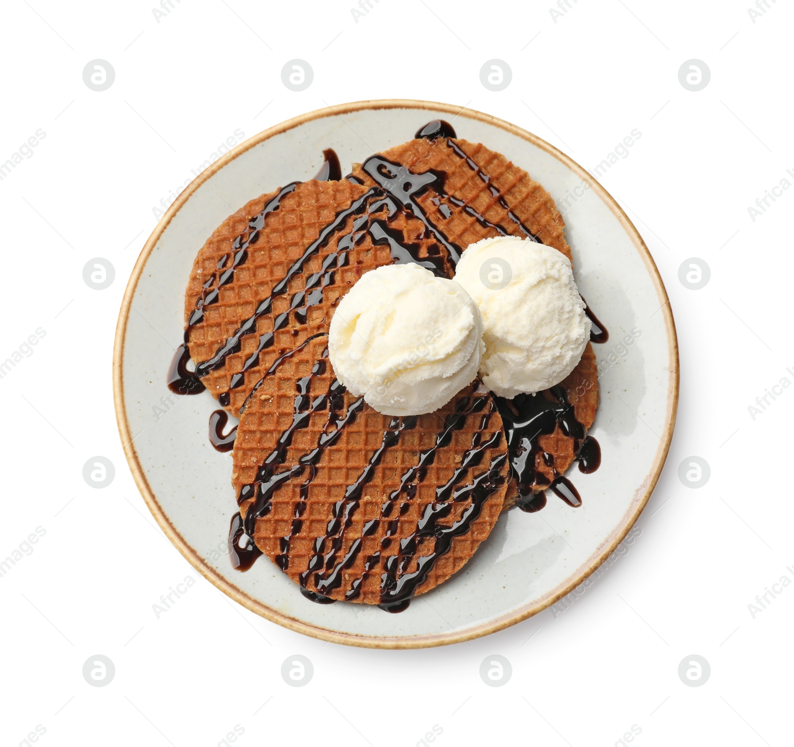 Tasty Dutch waffles (stroopwafels) with ice cream and chocolate sauce isolated on white, top view Photo of Tasty Dutch waffles (stroopwafels) with ice cream and chocolate sauce isolated on white, top view