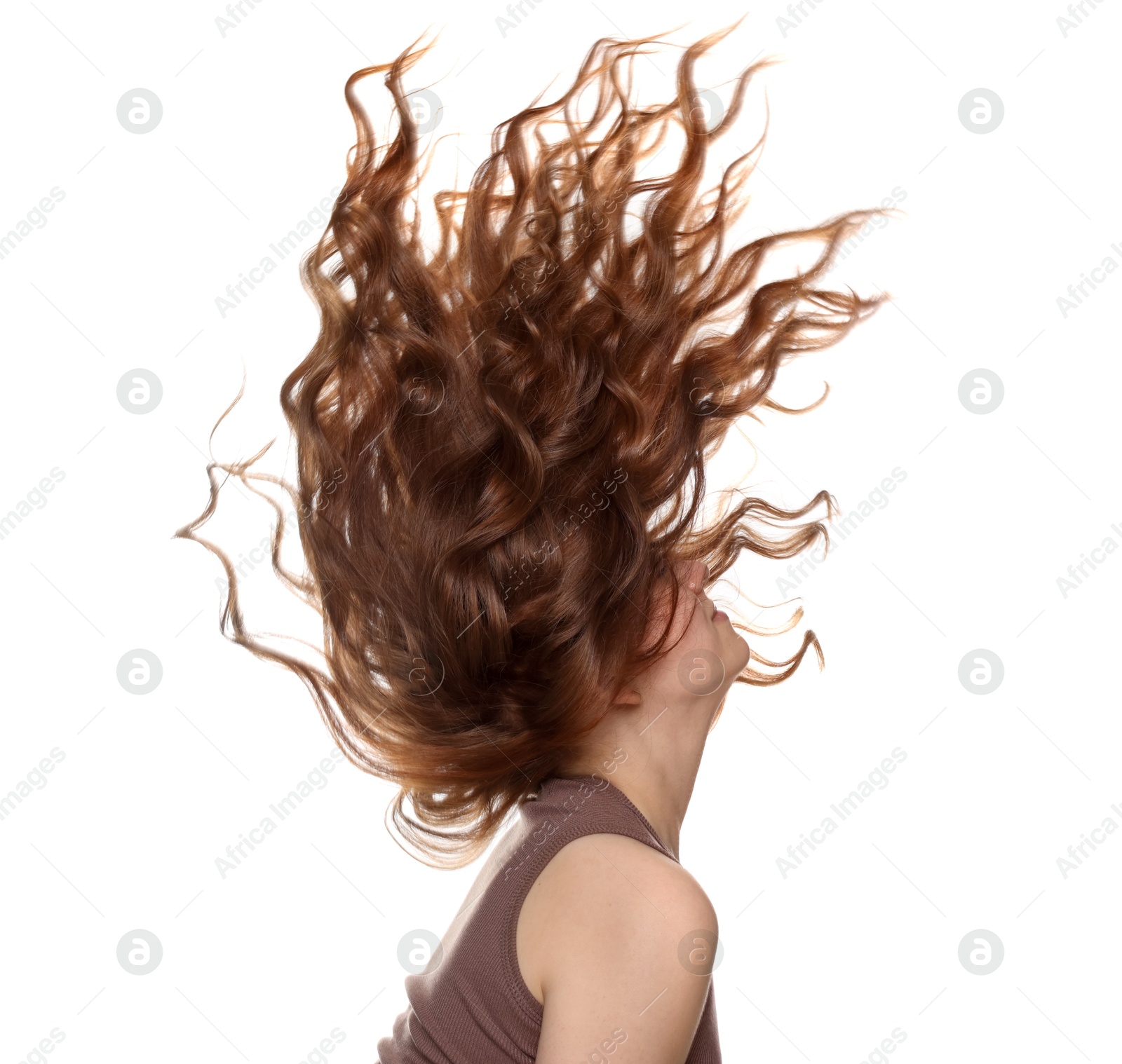 Teenage girl with healthy wavy hair on white background Photo of Teenage girl with healthy wavy hair on white background