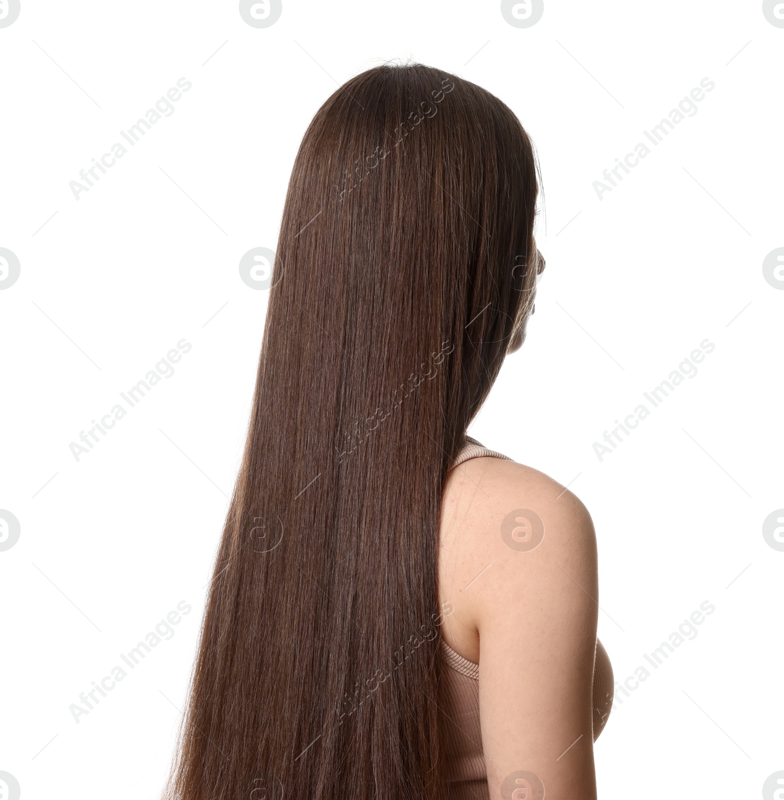 Teenage girl with healthy long hair on white background Photo of Teenage girl with healthy long hair on white background