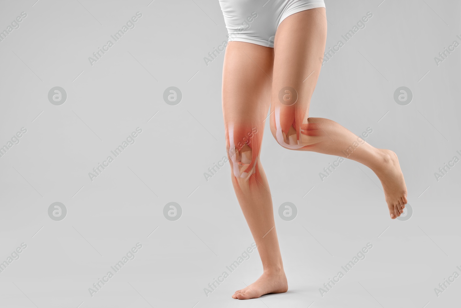 Anatomy of knee. Woman running against grey background, closeup. Illustration on her leg Image of Anatomy of knee. Woman running against grey background, closeup. Illustration on her leg
