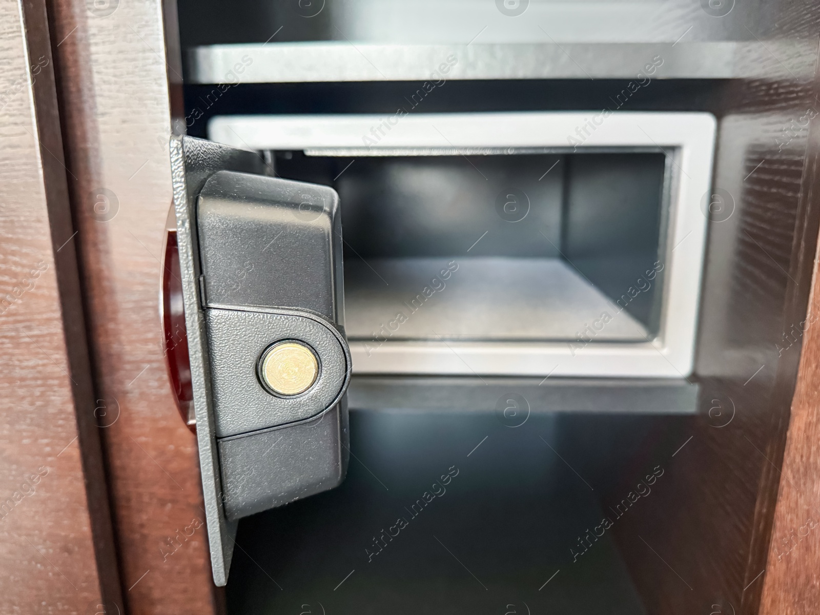 Open steel safe with electronic lock indoors, closeup Photo of Open steel safe with electronic lock indoors, closeup