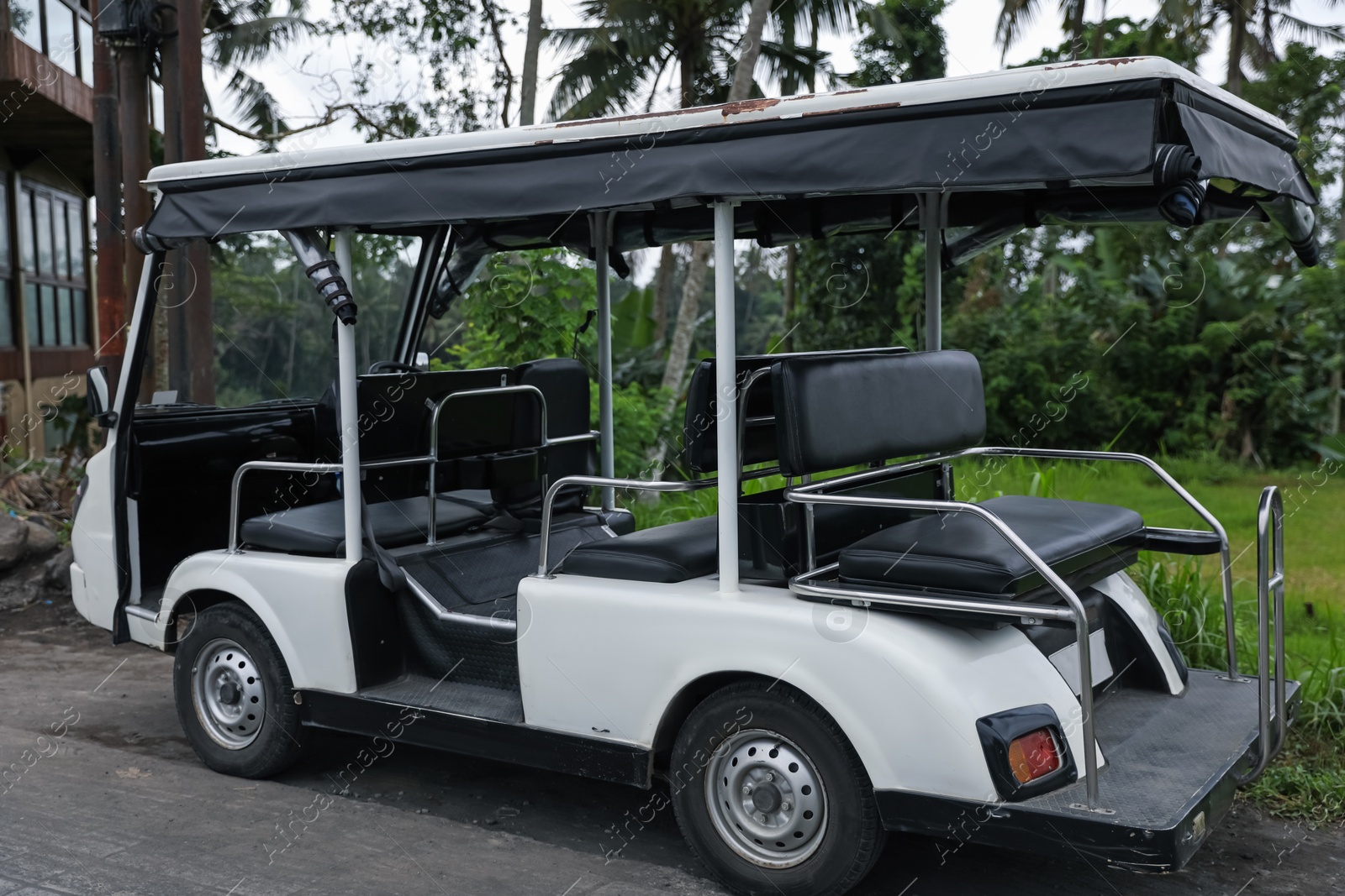 View of modern touristic golf cart outdoors Photo of View of modern touristic golf cart outdoors