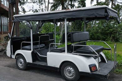 Photo of View of modern touristic golf cart outdoors