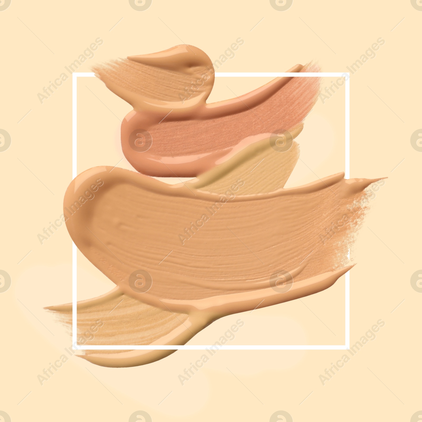 Image of Different shades of foundation and frame on beige background. Color palette of makeup product