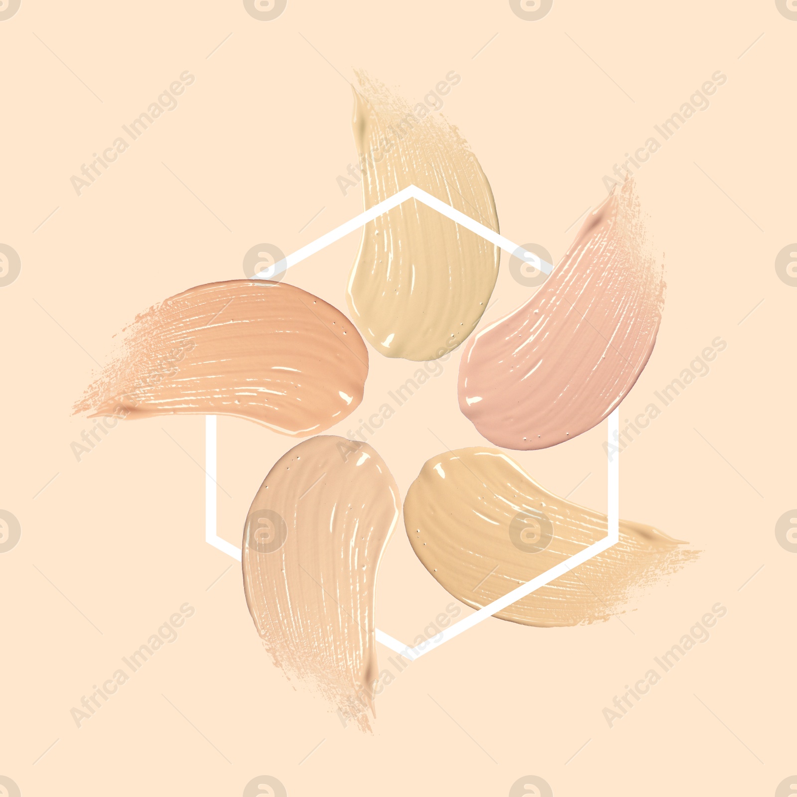 Image of Different shades of foundation and frame on beige background. Color palette of makeup product