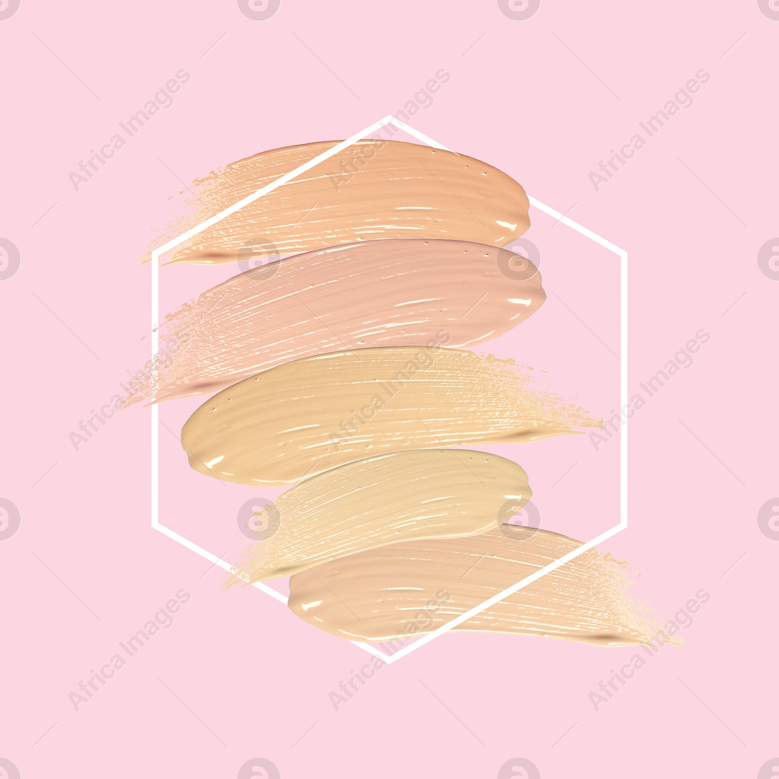 Image of Different shades of foundation and frame on pink background. Color palette of makeup product
