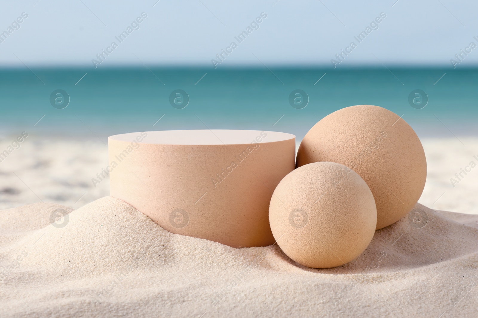 Podium for product presentation. Figures on sand near blue sea. Stylish promotion poster Image of Podium for product presentation. Figures on sand near blue sea. Stylish promotion poster