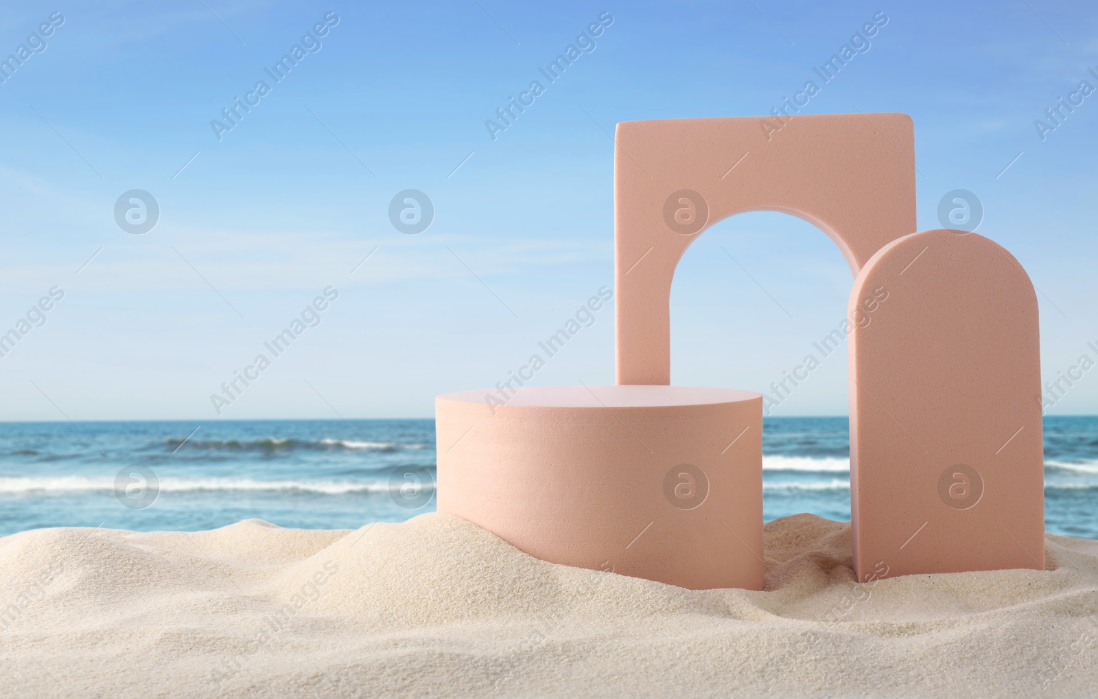 Podium for product presentation. Figures on sand near blue sea. Stylish promotion poster Image of Podium for product presentation. Figures on sand near blue sea. Stylish promotion poster