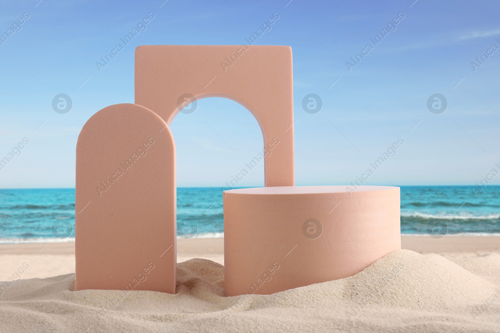 Podium for product presentation. Figures on sand near blue sea. Stylish promotion poster Image of Podium for product presentation. Figures on sand near blue sea. Stylish promotion poster