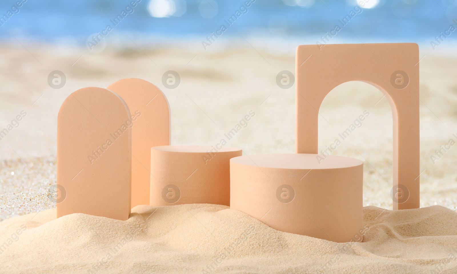 Podium for product presentation. Figures on sand near blue sea, banner design. Stylish promotion poster Image of Podium for product presentation. Figures on sand near blue sea, banner design. Stylish promotion poster
