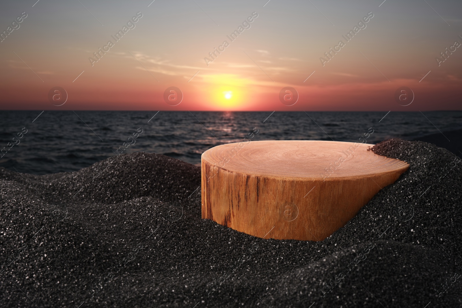 Podium for product presentation on black sand against seascape at sunset. Stylish promotion poster Image of Podium for product presentation on black sand against seascape at sunset. Stylish promotion poster