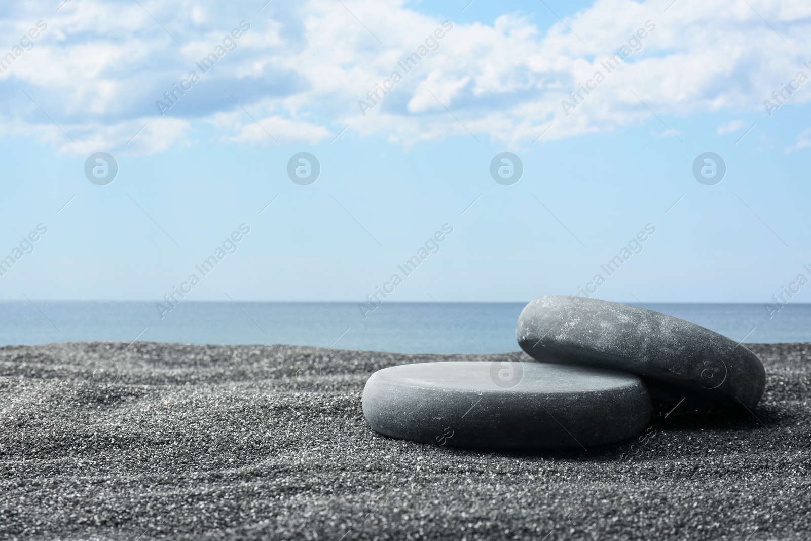 Podium for product presentation. Stones on sand near sea. Stylish promotion poster Image of Podium for product presentation. Stones on sand near sea. Stylish promotion poster