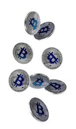 Image of Cryptocurrency. Silver bitcoins falling on white background