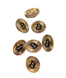 Image of Cryptocurrency. Golden bitcoins falling on white background