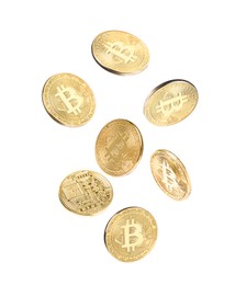 Image of Cryptocurrency. Golden bitcoins falling on white background