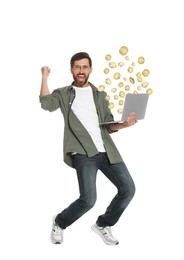 Image of Cryptocurrency. Happy man with laptop on white background. Bitcoins flying out of device