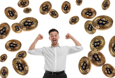 Image of Cryptocurrency. Happy man under falling bitcoins on white background