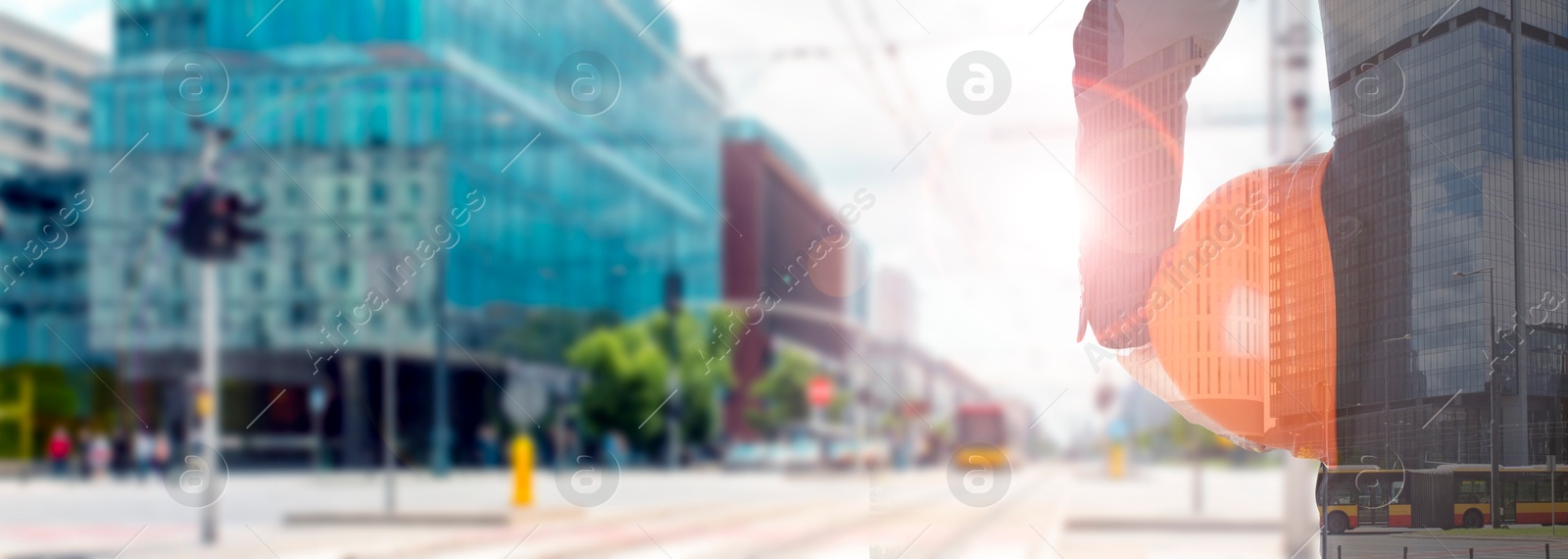 Worker with hard hat, multiple exposure with cityscape. Banner design Image of Worker with hard hat, multiple exposure with cityscape. Banner design