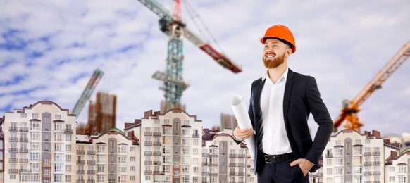 Image of Engineer in hard hat, multiple exposure with houses and construction site. Banner design