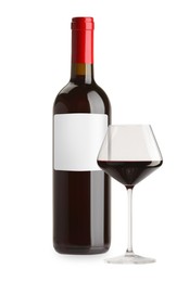 Image of Luxurious red wine in bottle with blank label and glass isolated on white