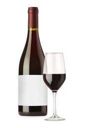 Image of Luxurious red wine in bottle with blank label and glass isolated on white