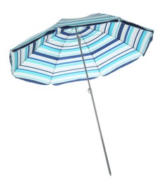 Photo of Open blue striped beach umbrella isolated on white