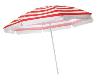 Photo of Open red striped beach umbrella isolated on white