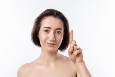 Photo of Woman with contact lens on white background