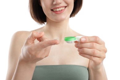 Photo of Woman with contact lens and case on white background, closeup