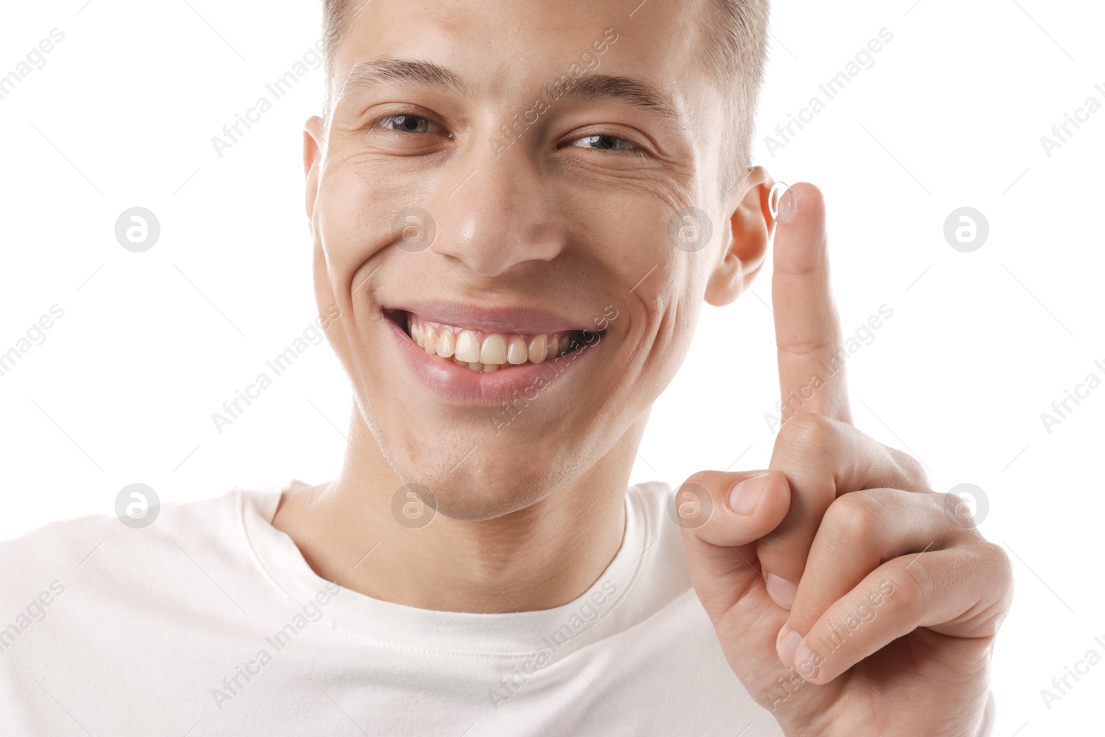 Man with contact lens on white background, closeup Photo of Man with contact lens on white background, closeup