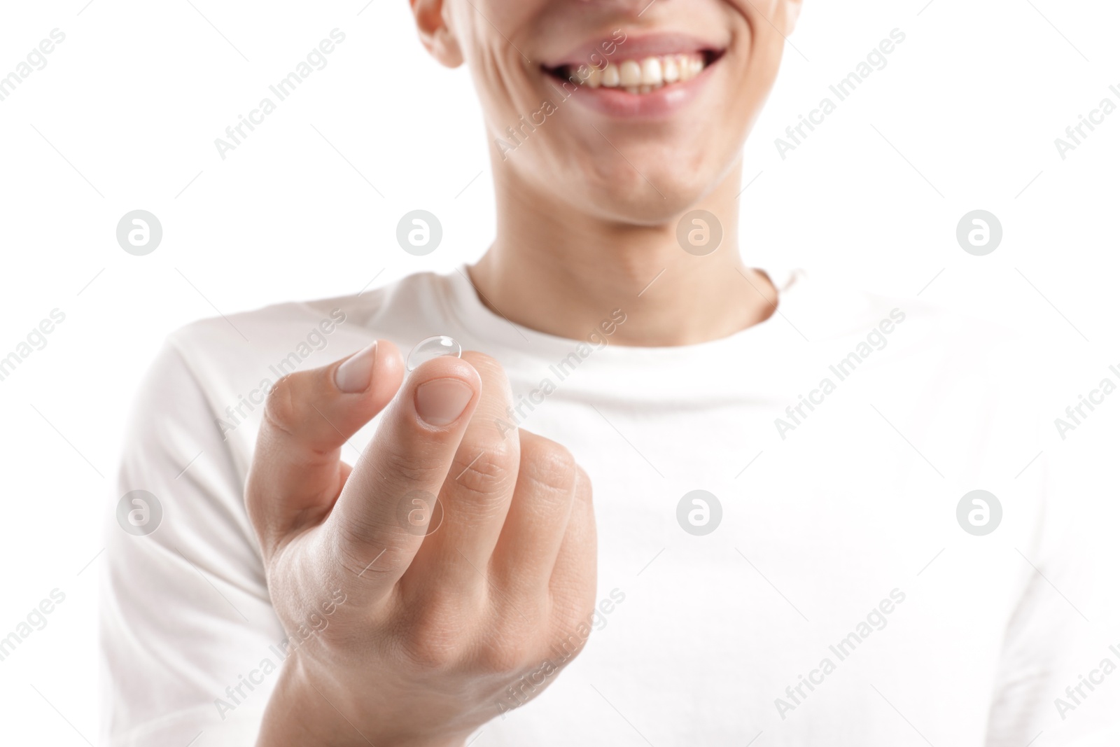 Man with contact lens on white background, closeup Photo of Man with contact lens on white background, closeup