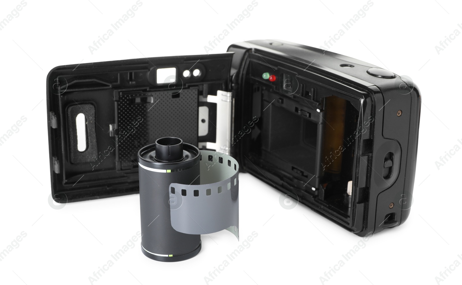 Roll of photographic film and photo camera isolated on white Photo of Roll of photographic film and photo camera isolated on white