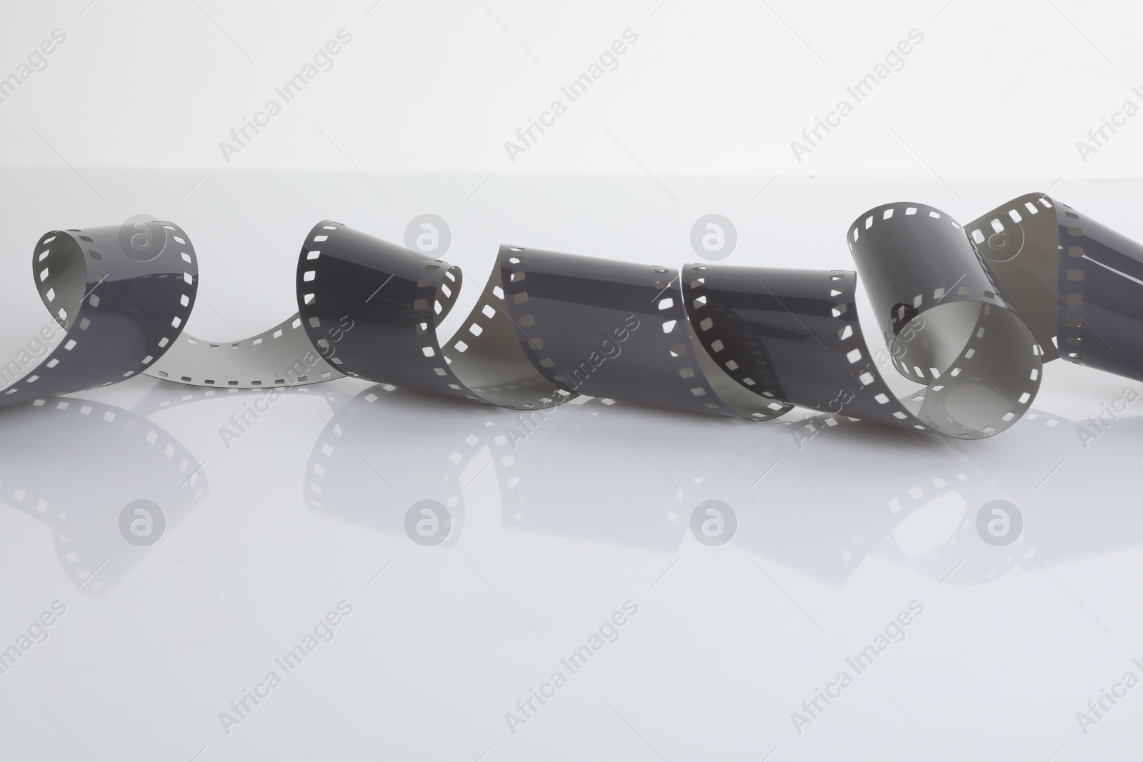 Strip of photographic film isolated on white Photo of Strip of photographic film isolated on white