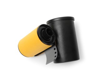Photo of Roll of photographic film and canister isolated on white, top view