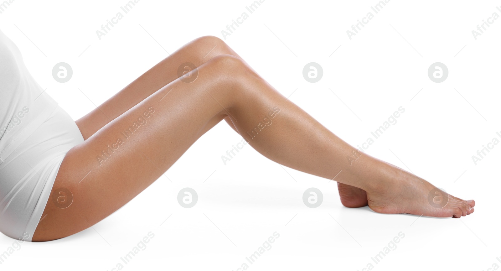 Woman with beautiful smooth legs after epilation on white background, closeup Photo of Woman with beautiful smooth legs after epilation on white background, closeup
