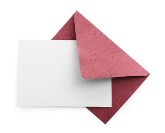 Photo of Blank invitation card and envelope isolated on white, top view. Space for design