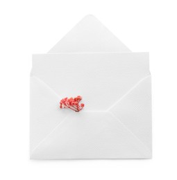 Photo of Blank invitation card and envelope with flower isolated on white, top view. Space for design