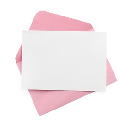 Photo of Blank invitation card and envelope isolated on white, top view. Space for design