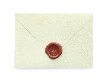 Photo of Beautiful invitation envelope with wax seal isolated on white, top view