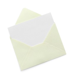 Photo of Blank invitation card and envelope isolated on white, top view. Space for design