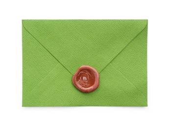 Photo of Beautiful invitation envelope with wax seal isolated on white, top view