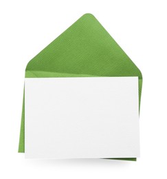 Photo of Blank invitation card and envelope isolated on white, top view. Space for design